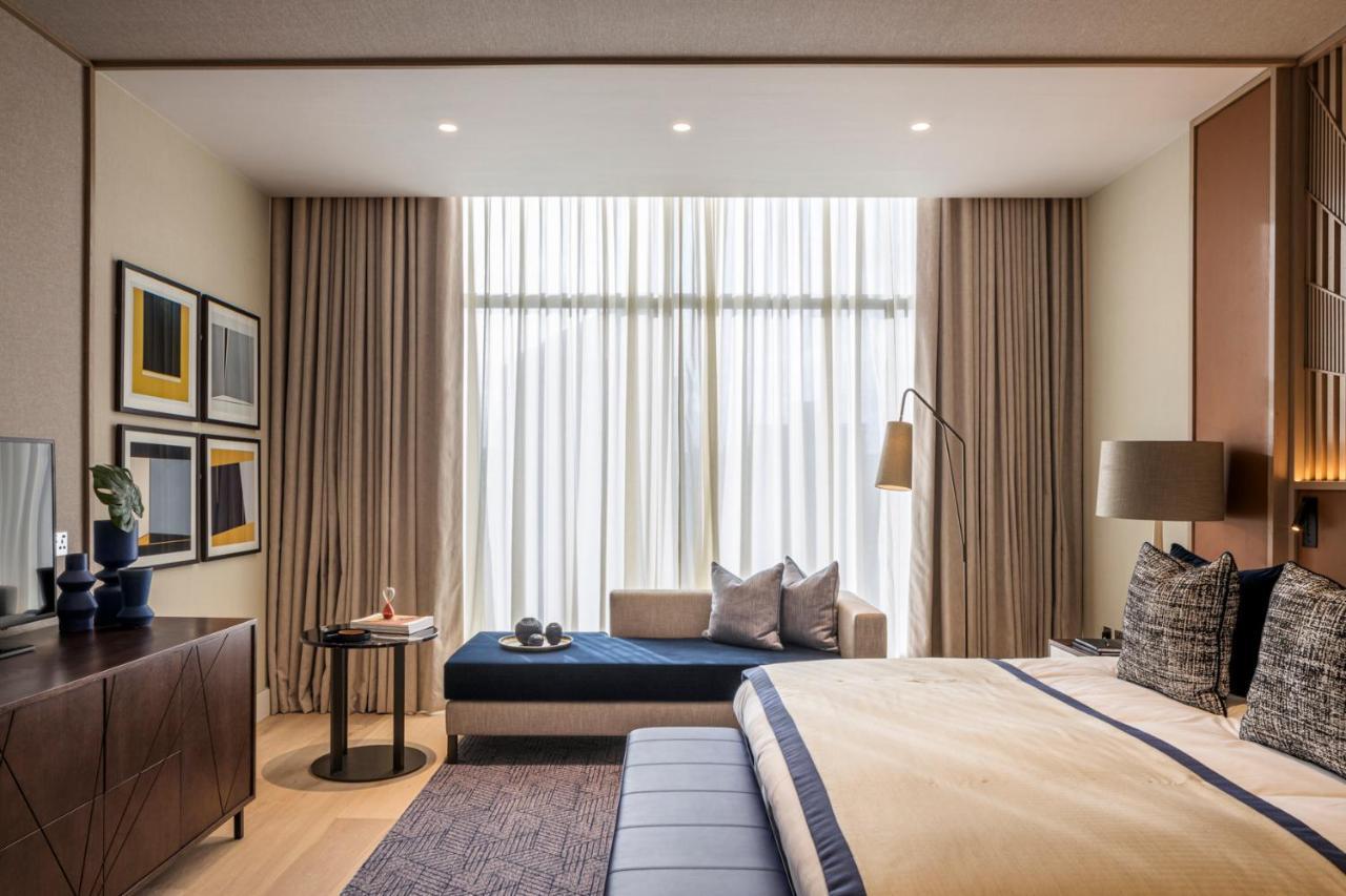 The Lowry Hotel Manchester Kültér fotó A bedroom at The Hari